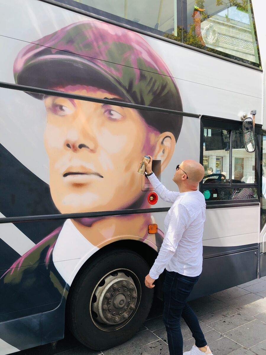 Stevie admires a Cillian Murphy bus in Cork city in 2018. The 1990s arts scene allowed actors and musicians to experiment.