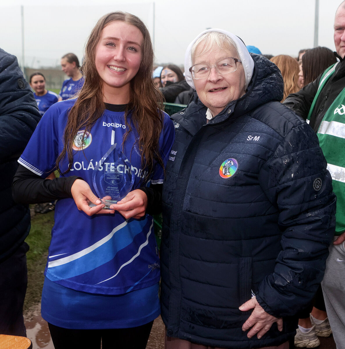 Tara O’Donoghue is presented with the Player of the Match award by Sister Mairead. Picture: INPHO/Laszlo Geczo