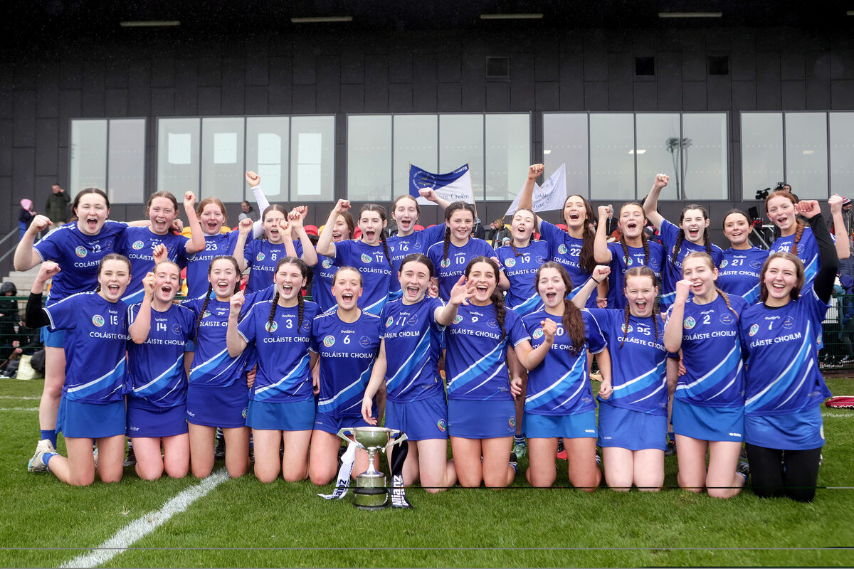 Coláiste Choilm celebrate with the trophy. Picture: INPHO/Laszlo Geczo
