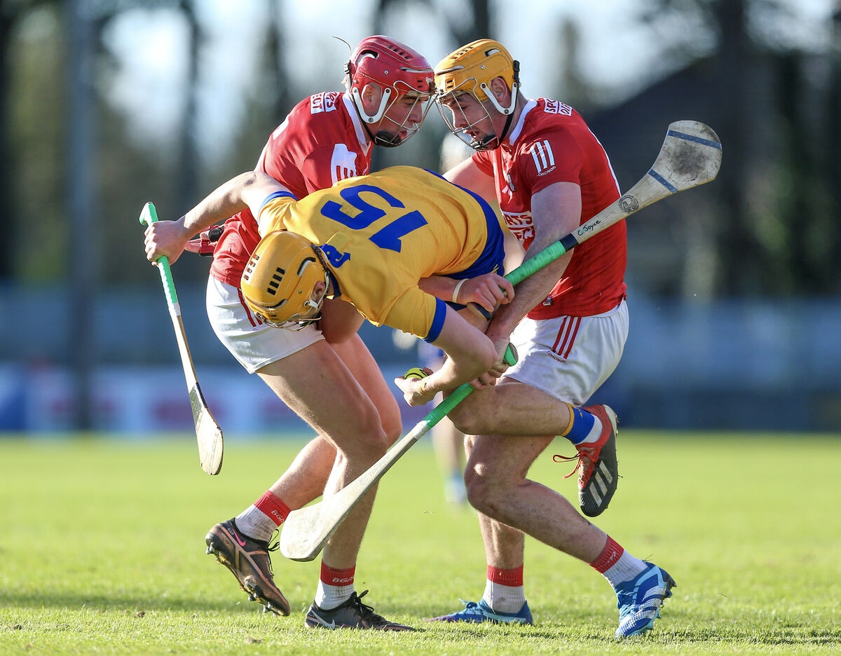 Clare’s Robin Mounsey is sandwiched between Ciarán Joyce and Sean Twomey. Picture: INPHO/Ken Sutton