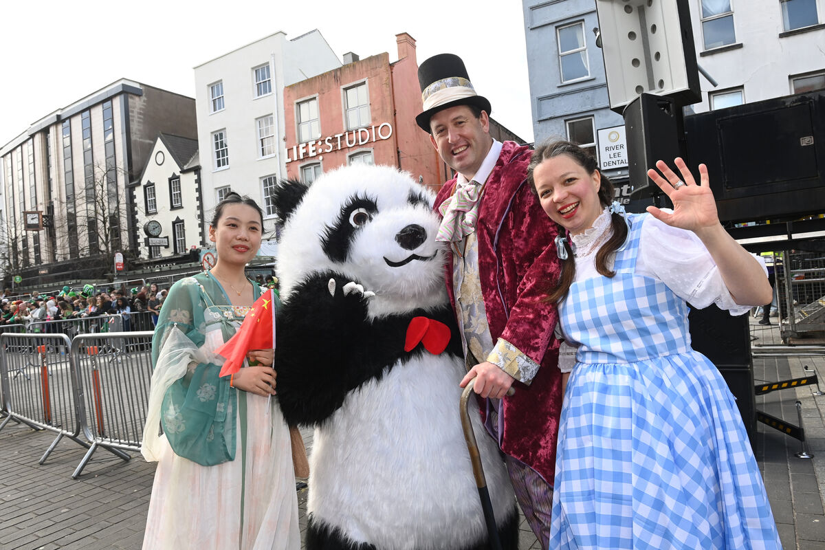  Lord Mayor Cllr Kieran McCarthy and Lady Mayoress Marcelline Bonneau meets a panda during the St Patrick's Day parade in Cork City. Picture: Larry Cummins.