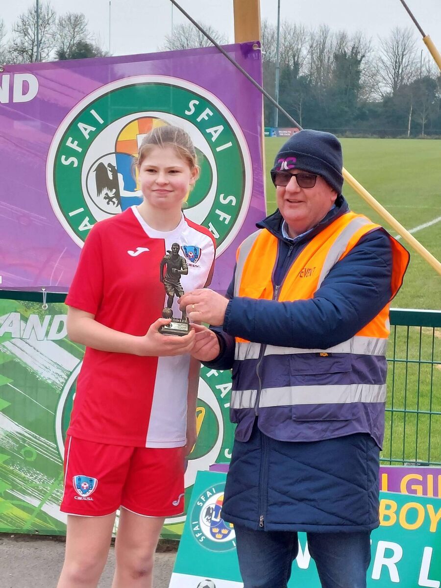 Anna Cronin receives her Player of the Match award after Cork won the U14 title recently. Picture: Liam Carmody. 