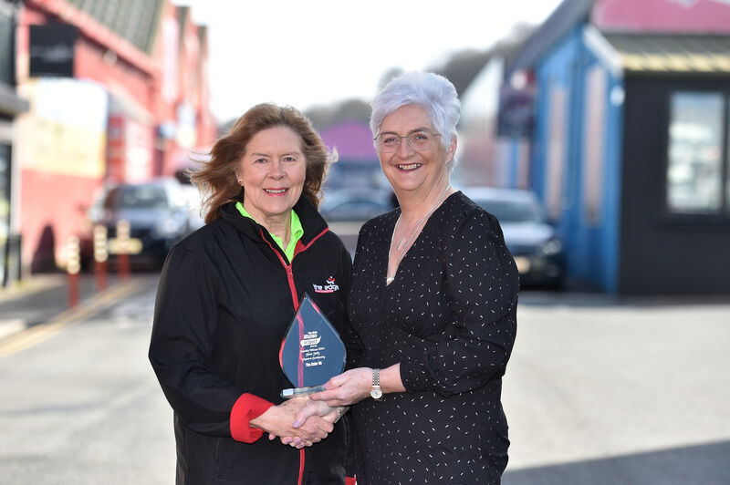 Masters swimmer Jane Jolly receiving the Echo Women in Sport Award from Mary Haughney, The Echo. Picture Dan Linehan
