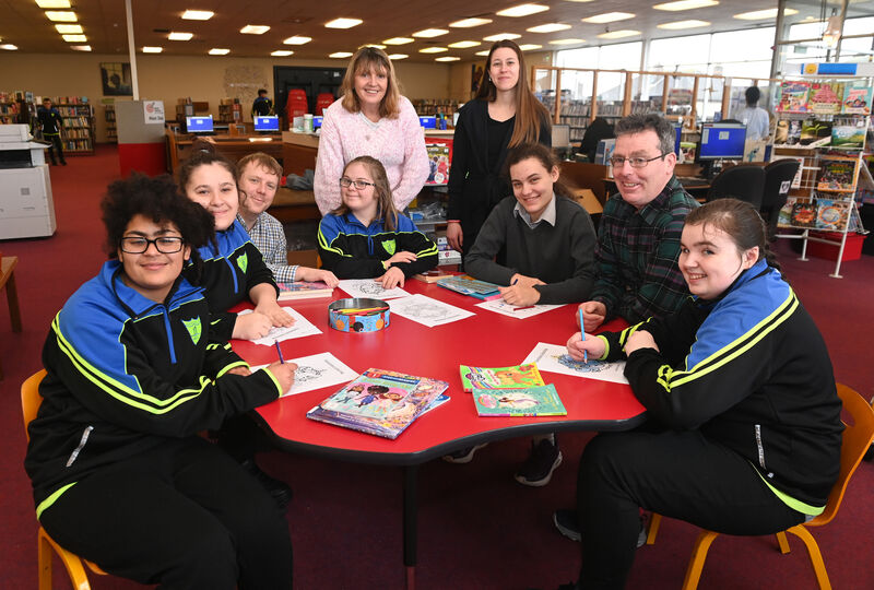  Richard Forrest, executive librarian with pupils from 3H class at Scoil Bernadette at Mayfield library. Picture; Eddie O'Hare