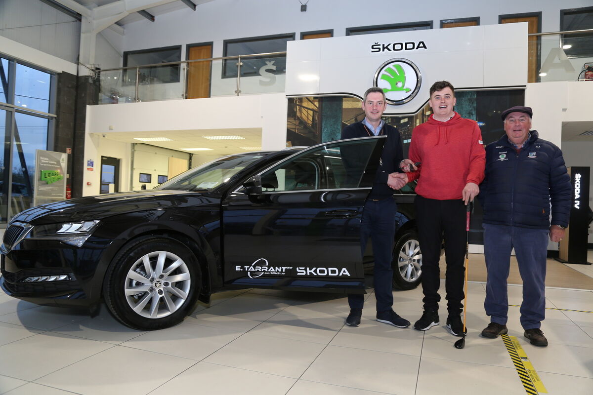 Eamonn and Connie Tarrant presenting James Sugrue with the keys of the Skoda Superb Comb. Picture: Sheila Fitzgerald