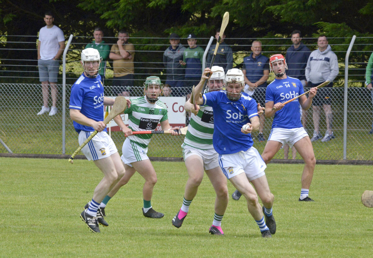 Valley Rovers' Seán McEntee challanges Michael Sheehan of Ballinhassing in last year's RedFM HL Division 4 final. The neighbours renew rivalries again this weekend. Picture: Denis Boyle Valley Rovers' Seán McEntee challanges Michael Sheehan of Ballinhassing in last year's RedFM HL Division 4 final. The neighbours renew rivalries again this weekend. Picture: Denis Boyle