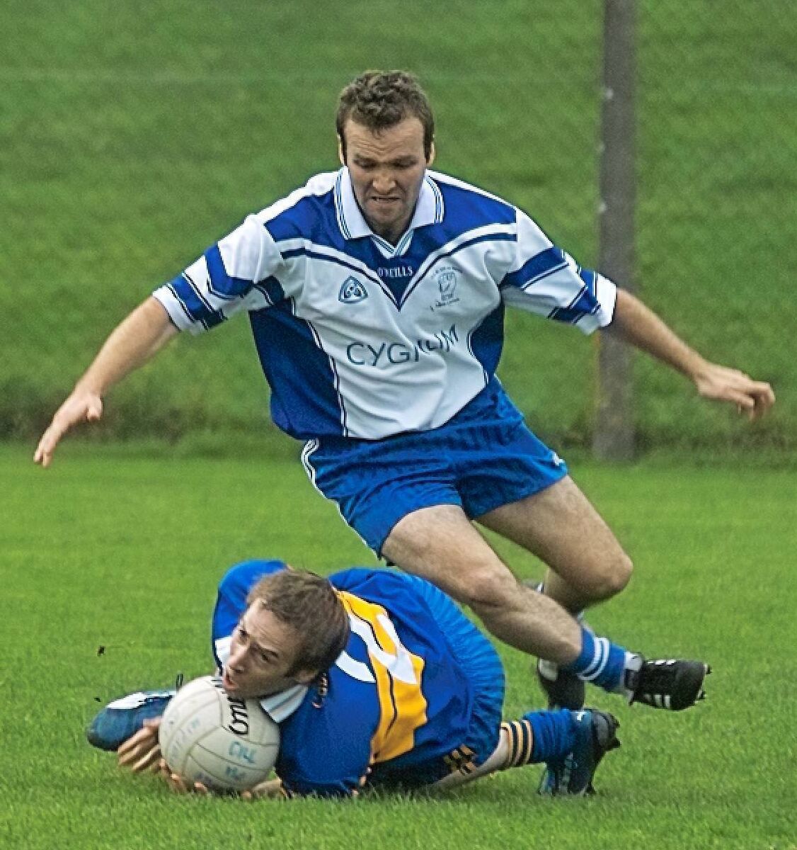 Cillian Forbes of Carrigaline keeps onto the ball despite pressure from Cill na Martra's Kevin O'Sullivan during the IFC semi-final at Carrigadrohid in 2007. Picture: Denis Boyle
