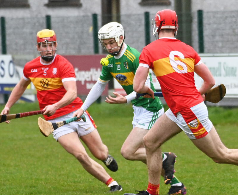 Jack Twomey breaks between Eire Óg's Diarmuid Dineen and Conor McGoldrick. Picture: Eddie O'Hare Jack Twomey breaks between Eire Óg's Diarmuid Dineen and Conor McGoldrick. Picture: Eddie O'Hare