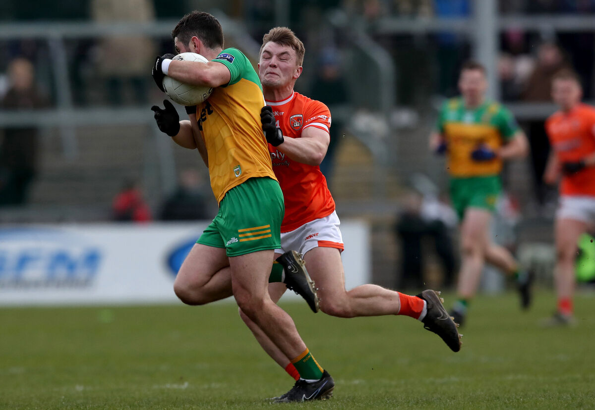 Armagh's Peter McGrane tackles Ryan McHugh of Donegal. Both teams have been promoted to Division 1 for 2025. Picture: ©INPHO/Leah Scholes Armagh's Peter McGrane tackles Ryan McHugh of Donegal. Both teams have been promoted to Division 1 for 2025. Picture: ©INPHO/Leah Scholes