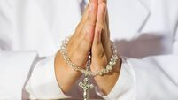 Close up of boy praying
