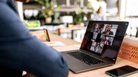 Close up of businessman having online meeting in the office