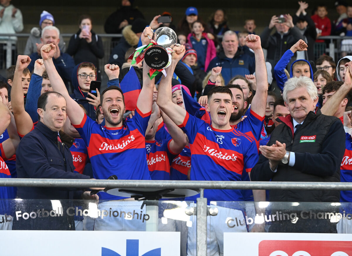 Erin's Own's joint-captains Tom Foley and James McMahon raise the Jimmy O'Mahony Cup after beating St Catherine's in the Co-op SuperStores Premier JHC final last year - they had also won Division 7 of the RedFM Hurling League. Picture: Eddie O'Hare