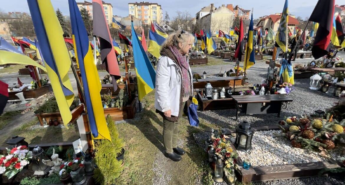 Fiona Corcoran, founder of the Greater Chernobyl Cause charity, visiting the Lviv Cemetery for Heroes in Ukraine. Picture: Brian Staveley.