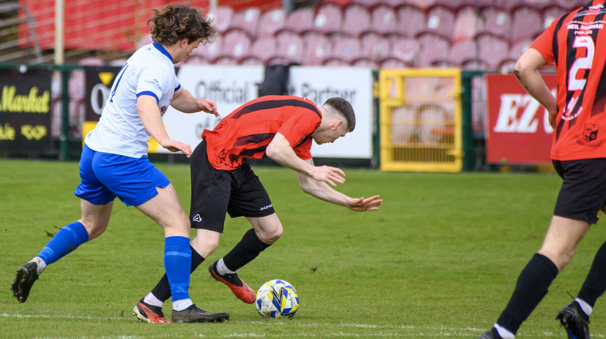 Shane O’Reilly, Blarney United getting in a tackle on Kalem Cashman. Picture Dan Linehan
Shane O’Reilly, Blarney United getting in a tackle on Kalem Cashman. Picture Dan Linehan