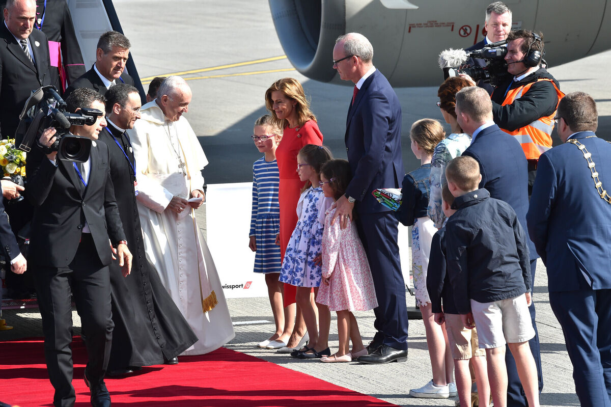  Pope Francis in 2018 with Simon Coveney then Minister for Foreign Affairs and Trade his wife Ruth and children, Beth, Jessica and Annalise at Dublin Airport. Picture Dan Linehan