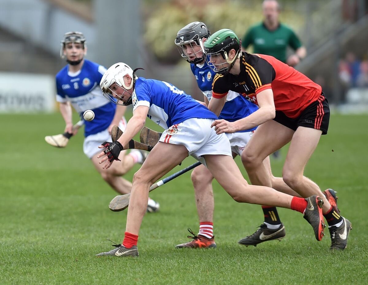 Ciarán Joyce of Midleton CBS is tackled by CBC's Niall Hartnett during the Munster Colleges Harty Cup final at Pairc Ui Rinn. Picture: Eddie O'Hare