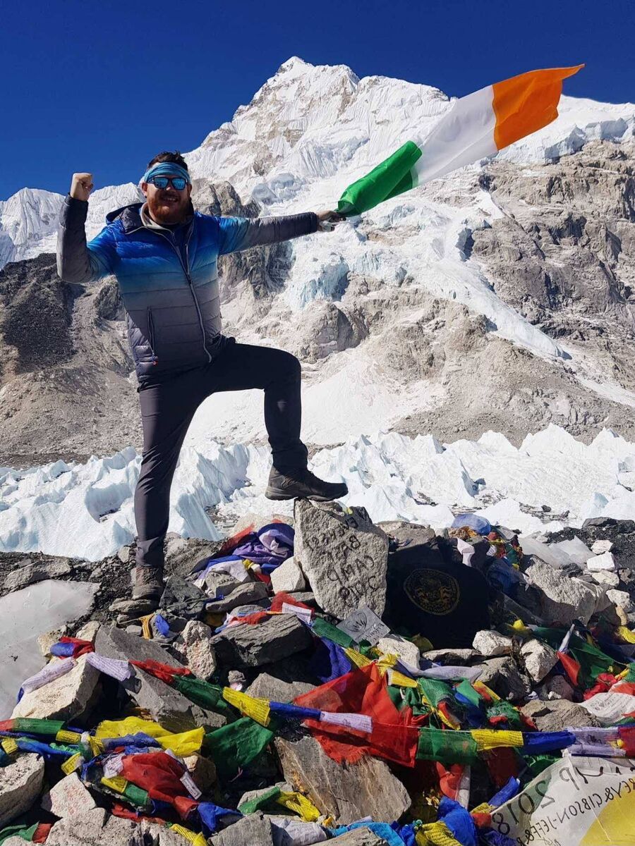 Troy at Everest Base Camp in 2019, which he reached after a 10 day trek.