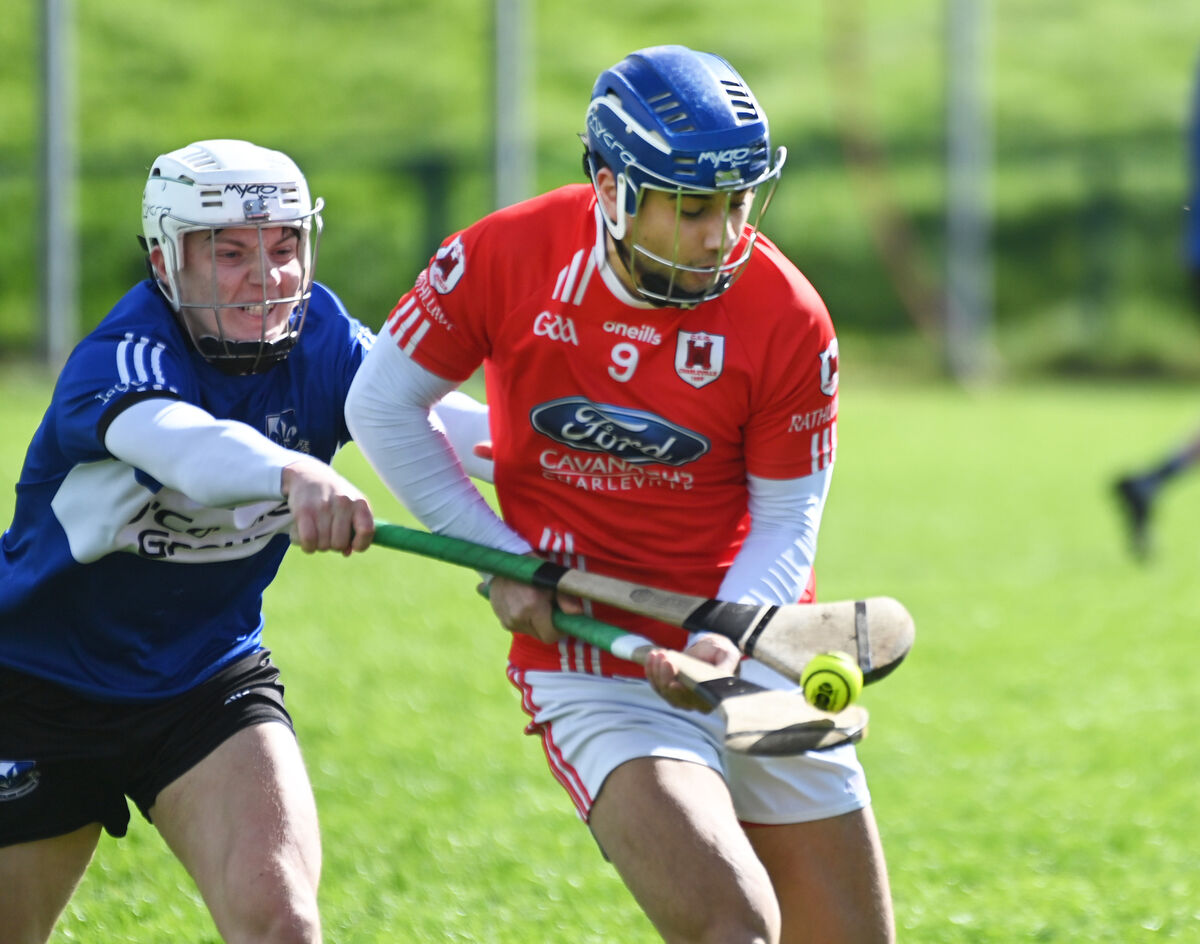 Charleville's Oran O'Connell is tackled by Sarsfields' Colm McCarthy. Picture:
