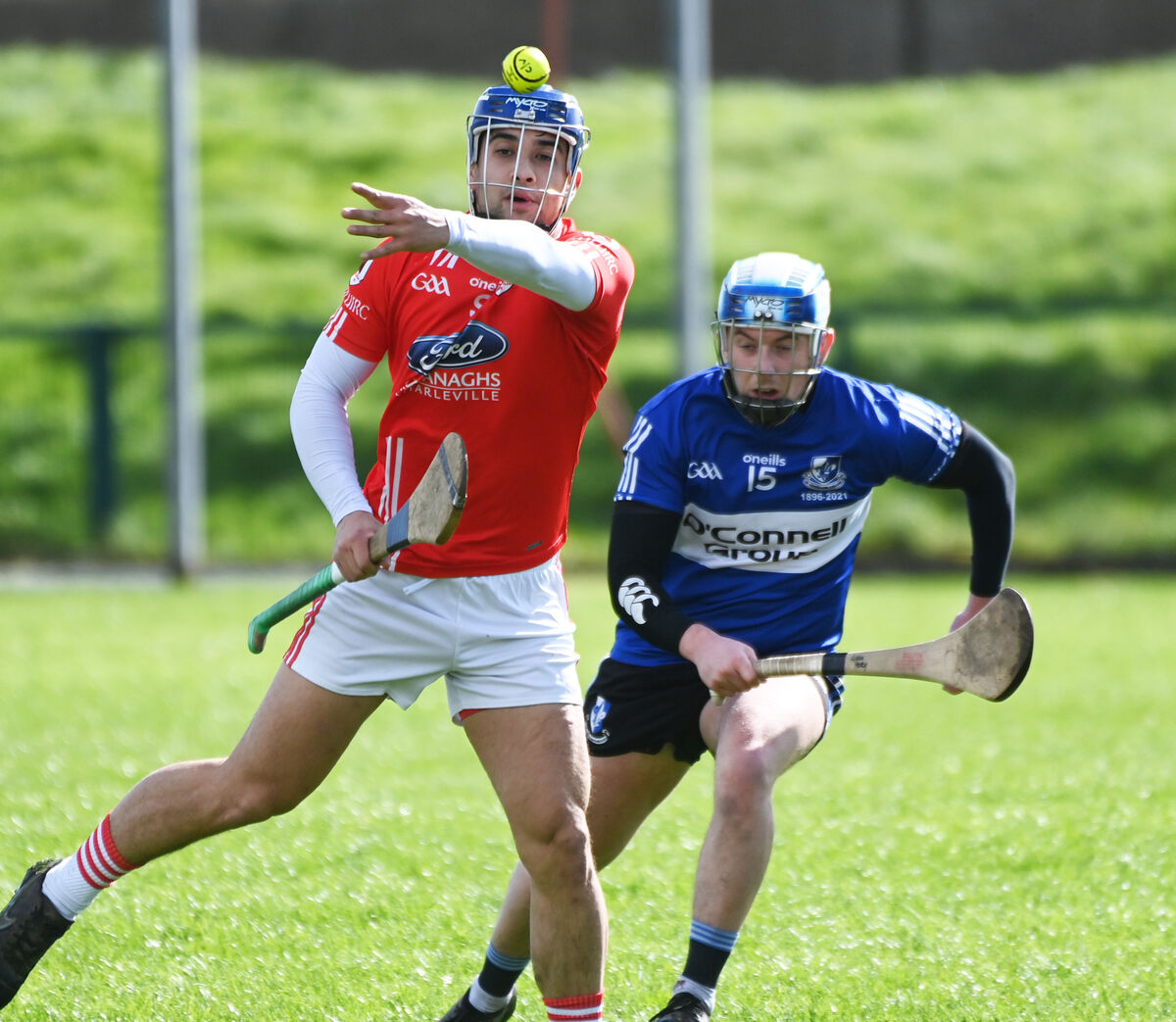 Charleville's Oran O'Connell gets his pass away despite the attentions of Liam Healy of Sarsfields. Picture: Eddie O'Hare Charleville's Oran O'Connell gets his pass away despite the attentions of Liam Healy of Sarsfields. Picture: Eddie O'Hare