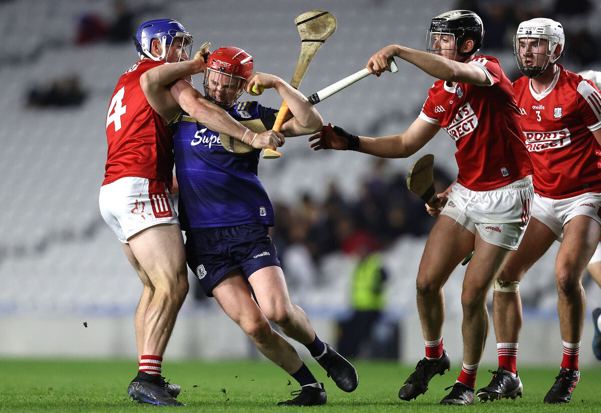 Galway's Tom Monaghan is tackled by Sean O'Donoghue and Ger Millerick of Cork. Picture: ©INPHO/Bryan Keane Galway's Tom Monaghan is tackled by Sean O'Donoghue and Ger Millerick of Cork. Picture: ©INPHO/Bryan Keane