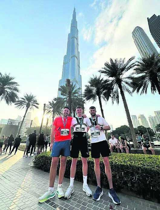 Kevin Dooley with Stephen Simmonds and Matthew Cain after taking part in the Burj2Burj Dubai half-marathon Kevin Dooley with Stephen Simmonds and Matthew Cain after taking part in the Burj2Burj Dubai half-marathon