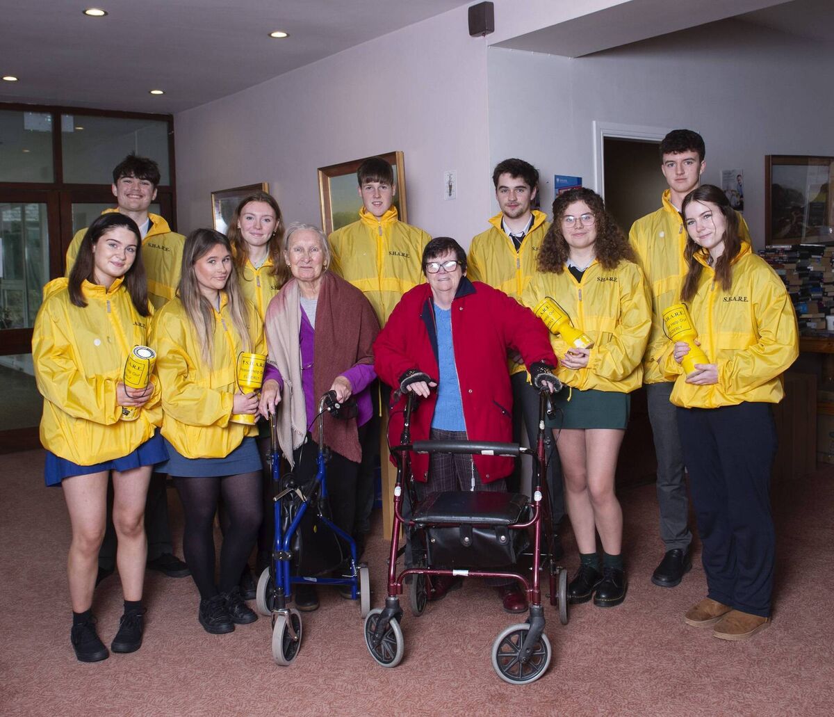 Ann Purcell, Coal Quay and Mary Theresa Nolan, Glanmire, both residents of Mount St Joseph with Andrew Maume, Chairman of the SHARE student executive committee 2023/24 and fellow members of the student executive committee. Photography By Gerard McCarthy.