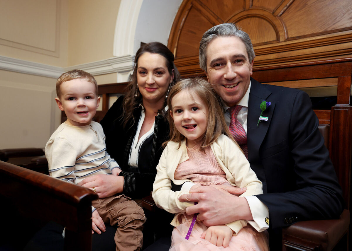 Simon Harris, Taoiseach with his wife Caoimhe and children Cillian and Saoirse in the Dáil Chamber, Leinster House. PIC: MAXWELLS Simon Harris, Taoiseach with his wife Caoimhe and children Cillian and Saoirse in the Dáil Chamber, Leinster House. PIC: MAXWELLS