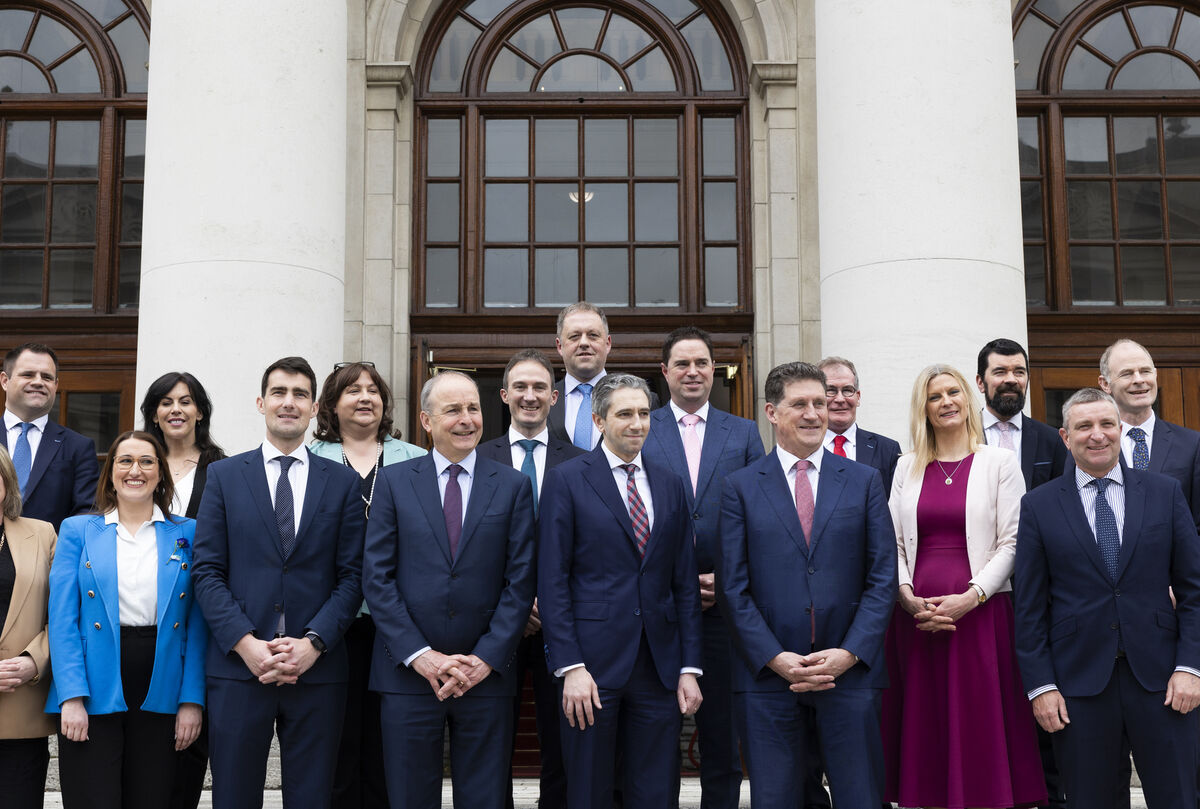 Tánaiste Micheál Martin , An Taoiseach Simon Harris TD and Leader of the Green Party Eamon Ryan surrounded by the junior ministers of the Cabinet. Photo Sam Boal/Collins Photos Tánaiste Micheál Martin , An Taoiseach Simon Harris TD and Leader of the Green Party Eamon Ryan surrounded by the junior ministers of the Cabinet. Photo Sam Boal/Collins Photos