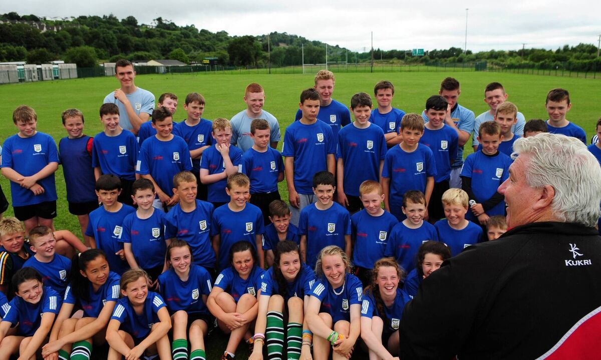 Boys and girls listening to Eddie Murphy during the 2014 Douglas GAA camp. Picture: Eddie O'Hare