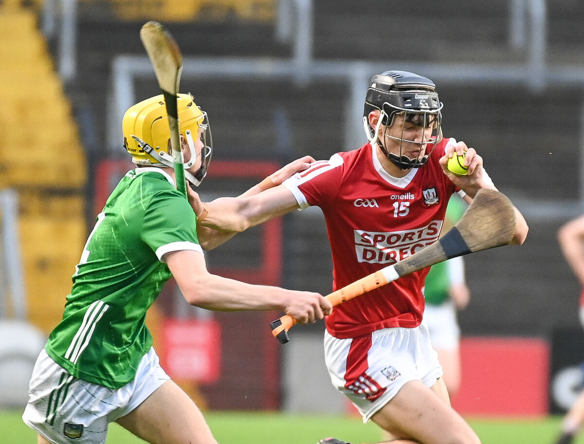 Cork's Michael Tadhg Brosnan drives past Limerick's Conor Ryan. Picture: David Keane