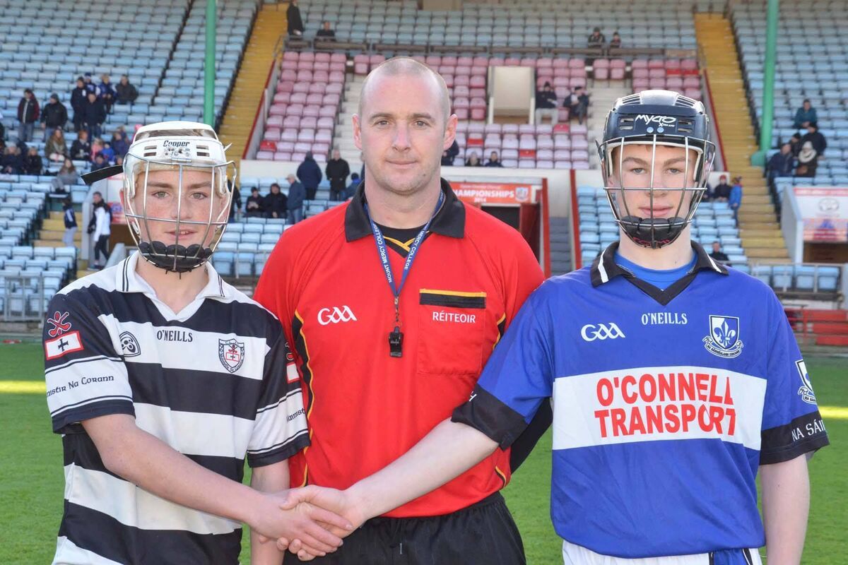 Referee Joe Larkin with team captains Tommy O'Connell and Sarsfields' John Kelleher before the Premier 1 U14 league final at Páirc Uí Chaoimh. Picture: Howard Crowdy Referee Joe Larkin with team captains Tommy O'Connell and Sarsfields' John Kelleher before the Premier 1 U14 league final at Páirc Uí Chaoimh. Picture: Howard Crowdy