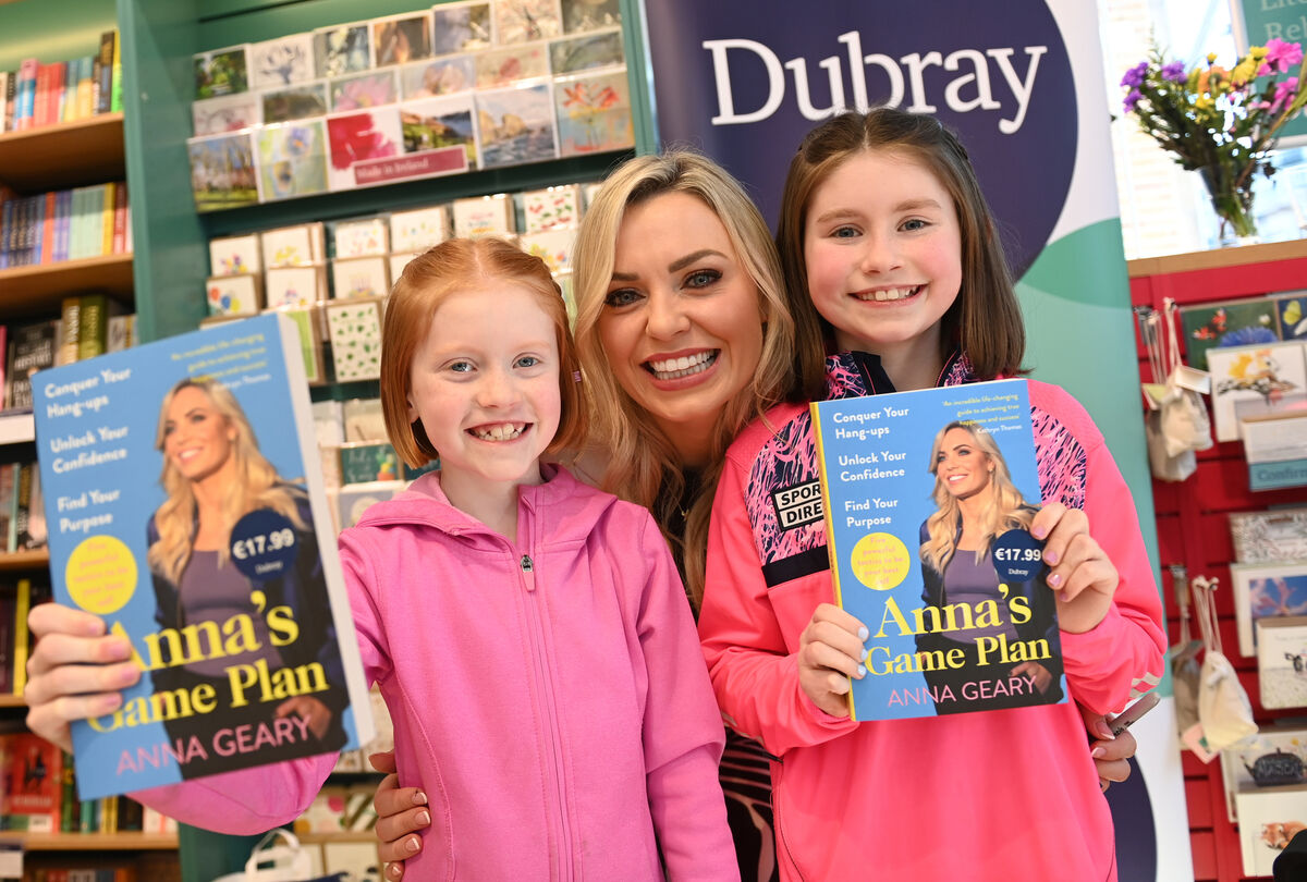 Young fans Eva and Kate O'Mahony, Cloghduv with Anna Geary at the book signing for 'Anna's Game Plan', by Anna Geary at Dubray Books on St Patrick's Street Cork. Pic Larry Cummins  Young fans Eva and Kate O'Mahony, Cloghduv with Anna Geary at the book signing for 'Anna's Game Plan', by Anna Geary at Dubray Books on St Patrick's Street Cork. Pic Larry Cummins