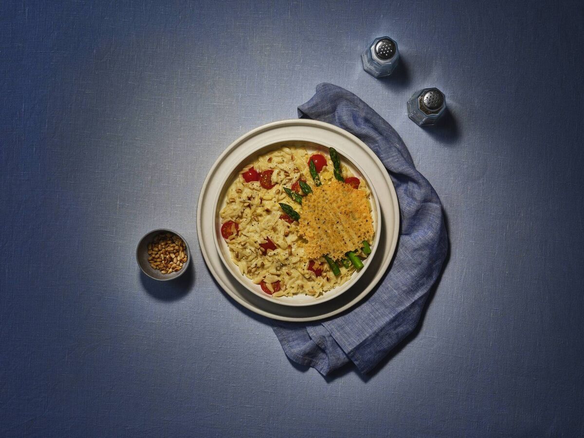  Bluey-inspired cheesy asparagus with tomato orzo recipe from Gousto.