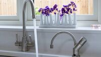 Modern Kitchen Tap (faucet) mixer with water running