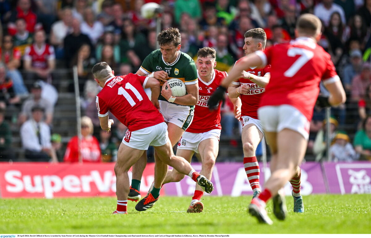 David Clifford of Kerry is tackled by Seán Powter. Picture: Brendan Moran/Sportsfile