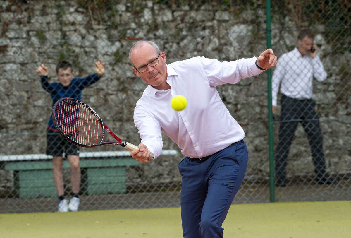 Simon Coveney TD enjoying a game of tennis at the Bishopstown Lawn Tennis Club, Cork. Picture Dan Linehan