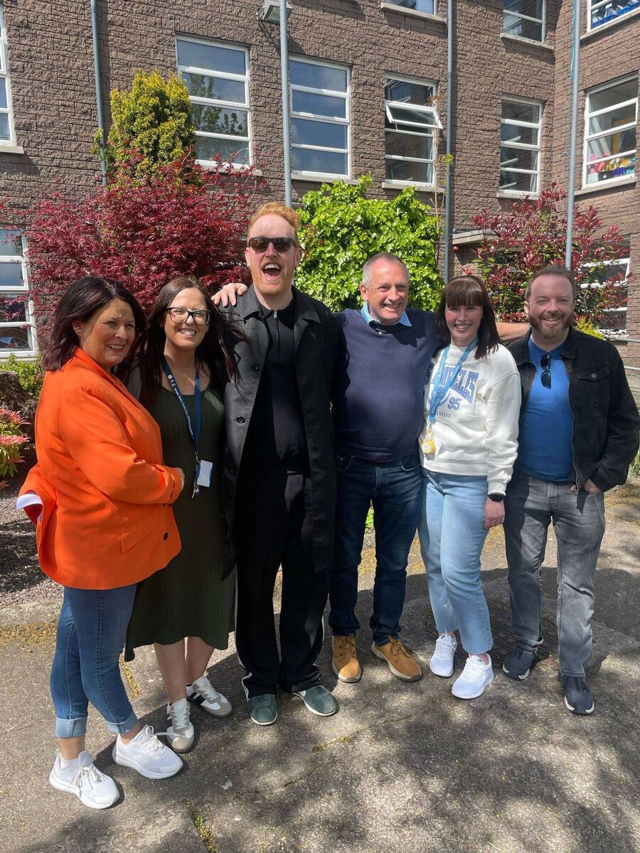 Gavin James with staff at Scoil Iosagain, Farranree during his surprise visit to the school.. Pic: Jim O'Connell. Gavin James with staff at Scoil Iosagain, Farranree during his surprise visit to the school.. Pic: Jim O'Connell.