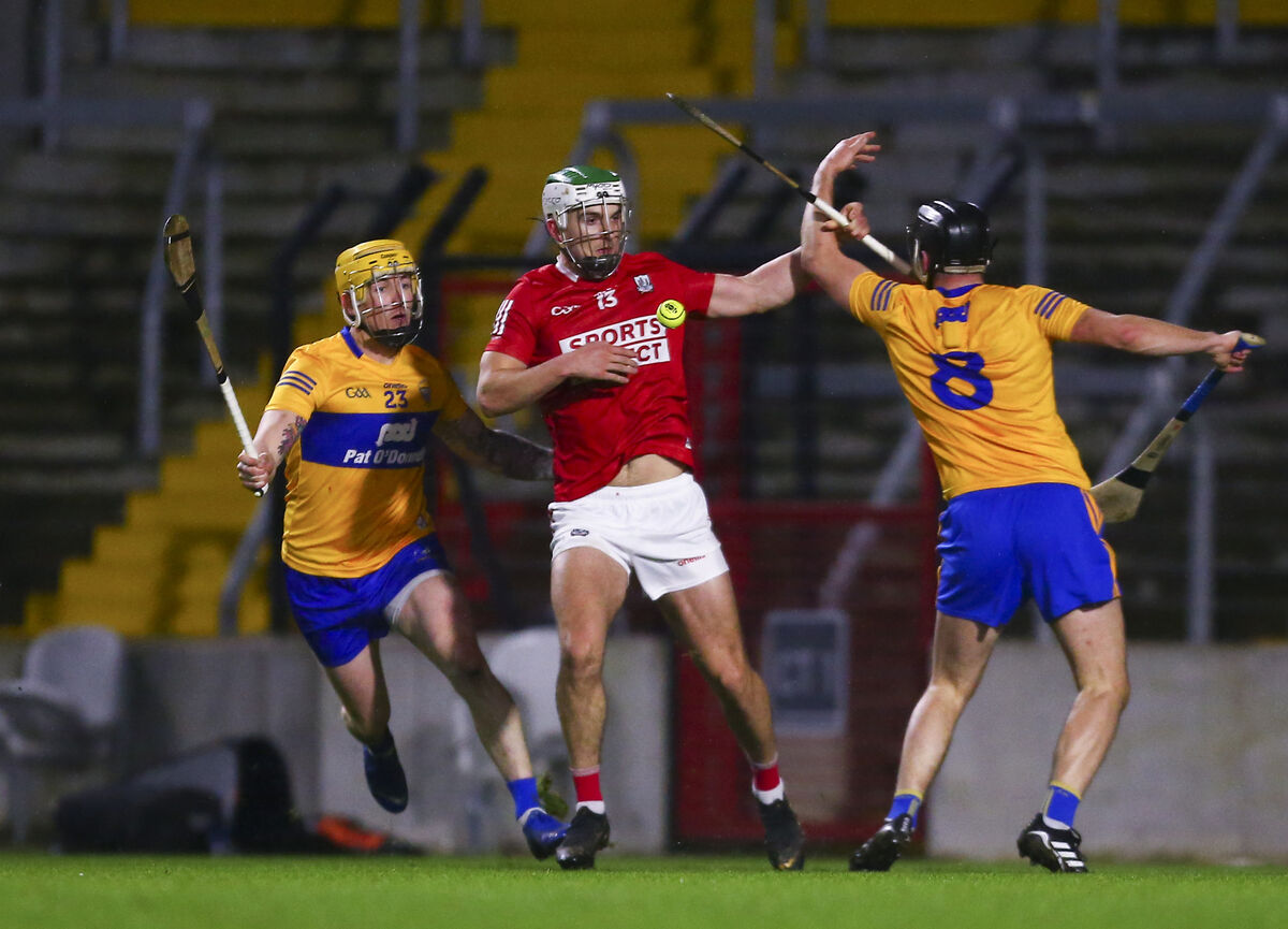 Shane Kingston battling Clare's Jack Browne and Aaron Fitzgerald. Picture: INPHO/Ken Sutton