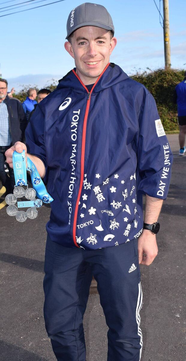 St Finbarr's runner Dave Butler pictured at the Ballintotis race with his medals from the six Major Marathons: New York, Chicago, Berlin, London, Boston and Tokyo. Dave started his quest of competing all six back in 2018 and achieved his goal at Tokyo this March. Picture: John Walshe 