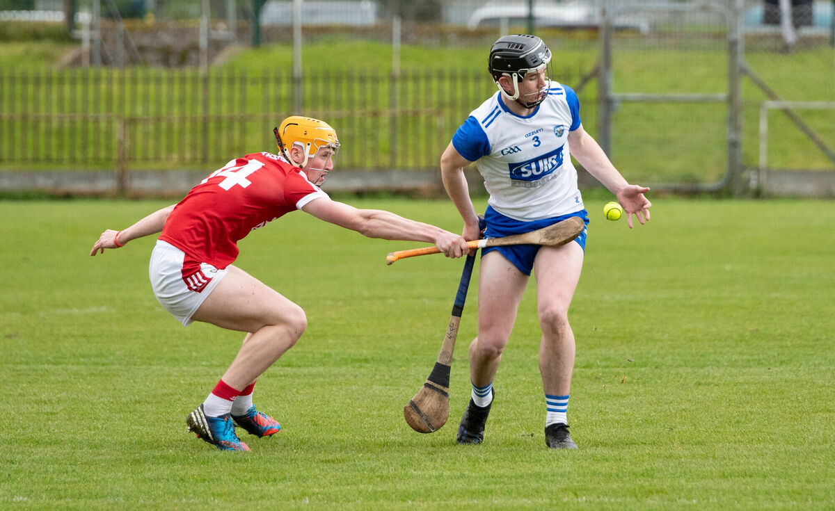 Joe Twohig of Cork applies pressure to Waterford's Fiachra Cooney. Picture: Howard Crowdy