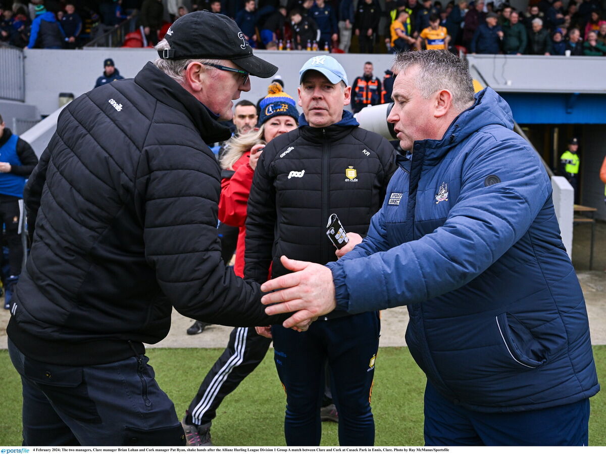 Cork manager Pat Ryan (right) with his Clare counterpart Brian Lohan in February. Picture: Ray McManus/Sportsfile