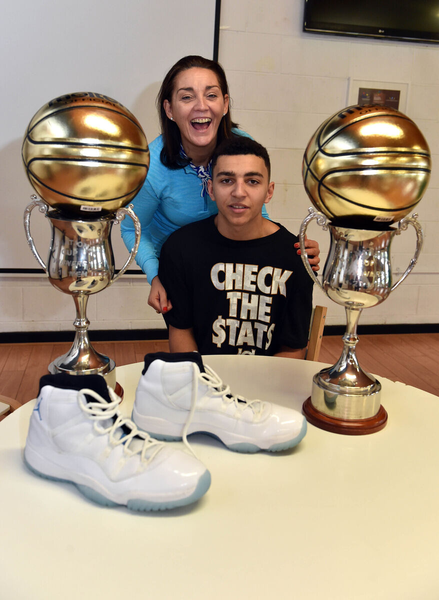 Neptune's Sean Jenkins with his mother Angelene Myers after winning two MVP awards in the U18 and U20 National Cup finals in 2016. Picture: Eddie O'Hare Neptune's Sean Jenkins with his mother Angelene Myers after winning two MVP awards in the U18 and U20 National Cup finals in 2016. Picture: Eddie O'Hare