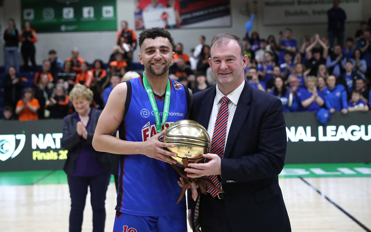 Griffith College Eanna's Sean Jenkins is presented the MVP award by John Feehan. Picture: INPHO/Bryan Keane Griffith College Eanna's Sean Jenkins is presented the MVP award by John Feehan. Picture: INPHO/Bryan Keane