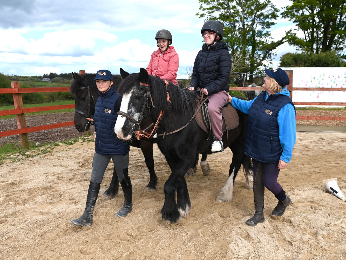 St. Patrick's College student Grace O'Callaghan with her mother Sharon and staff Aisling Meehan and Julia Buckley, proprietor during equine therapy classes at Equine Therapy Cork. Picture; Eddie O'Hare St. Patrick's College student Grace O'Callaghan with her mother Sharon and staff Aisling Meehan and Julia Buckley, proprietor during equine therapy classes at Equine Therapy Cork. Picture; Eddie O'Hare
