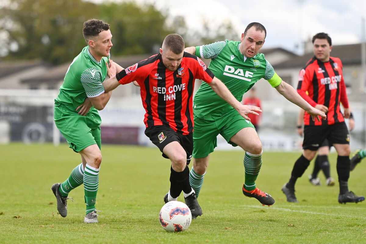 Anthony McAlavey of Ringmahon Rangers in action against Roy Kierans, left, and Noel Barrett of Glebe North during the FAI Intermediate Cup Final between Glebe North FC of the Leinster Senior League and Ringmahon Rangers FC of the Munster Senior League at Weaver's Park in Drogheda, Louth. Photo by Ben McShane/Sportsfile Anthony McAlavey of Ringmahon Rangers in action against Roy Kierans, left, and Noel Barrett of Glebe North during the FAI Intermediate Cup Final between Glebe North FC of the Leinster Senior League and Ringmahon Rangers FC of the Munster Senior League at Weaver's Park in Drogheda, Louth. Photo by Ben McShane/Sportsfile