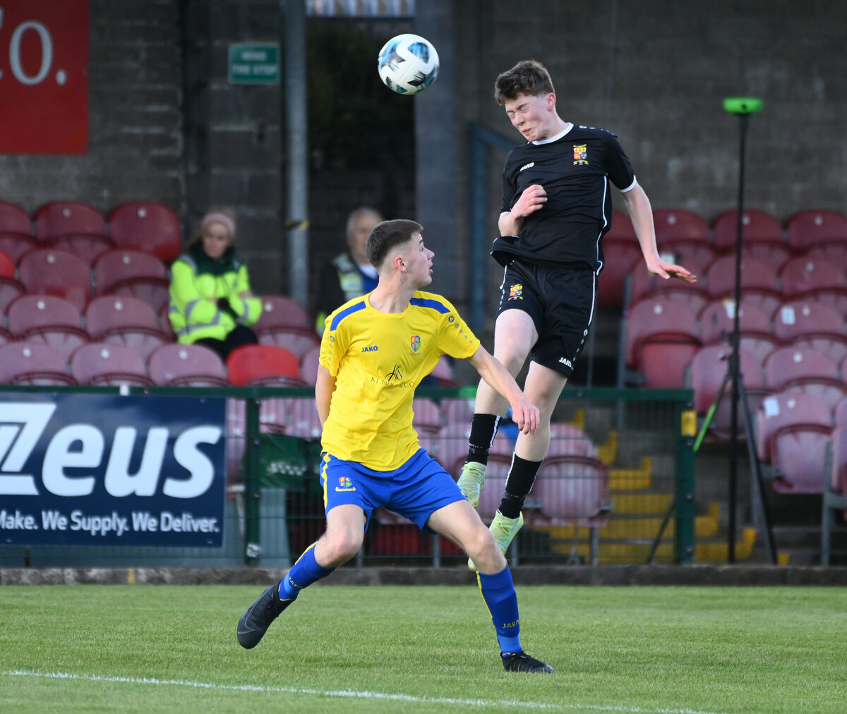 College Corinthians Brian O'Sullivan-Connell heads from Carrigaline United's Dylan Sutton during the Jako Ireland Munster youth cup final at Turner's Cross. Picture: Eddie O'Hare