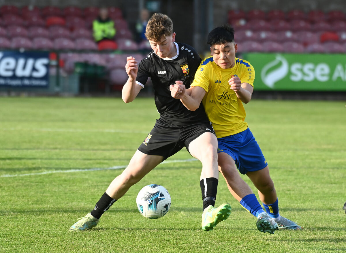 College Corinthians Brian O'Sullivan-Connell and Carrigaline United's Connor O'Leary tussle for the ball during the Jako Ireland Munster youth cup final at Turner's Cross. Picture: Eddie O'Hare