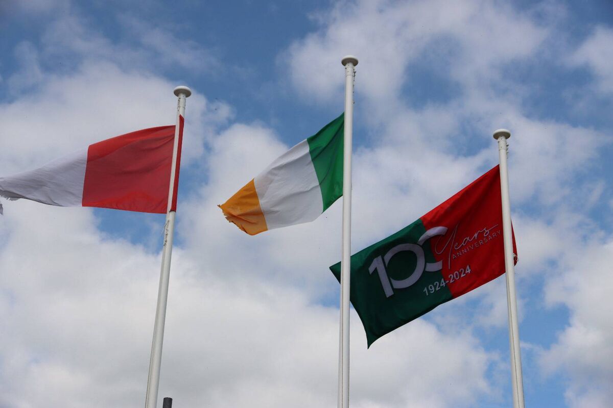 The Cork, Ireland and Ballinora flags flying high at Ballinora GAA's 100th birthday.