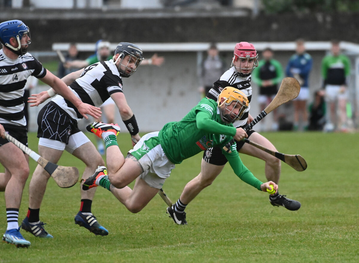 Killeagh's Sean Long is tackled by Midleton trio Pa White, Sam Quirke and Alex Quirke. Picture: Eddie O'Hare
