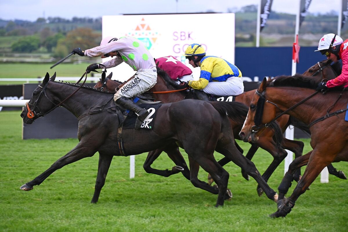 Chapeau De Soleil and Brian Hayes (near) win the SBK Gold Trophy Handicap Hurdle (Listed) from Beacon Edge (far). Picture: Healy Racing 